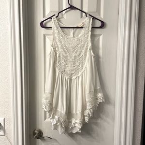 White sleeveless dress top